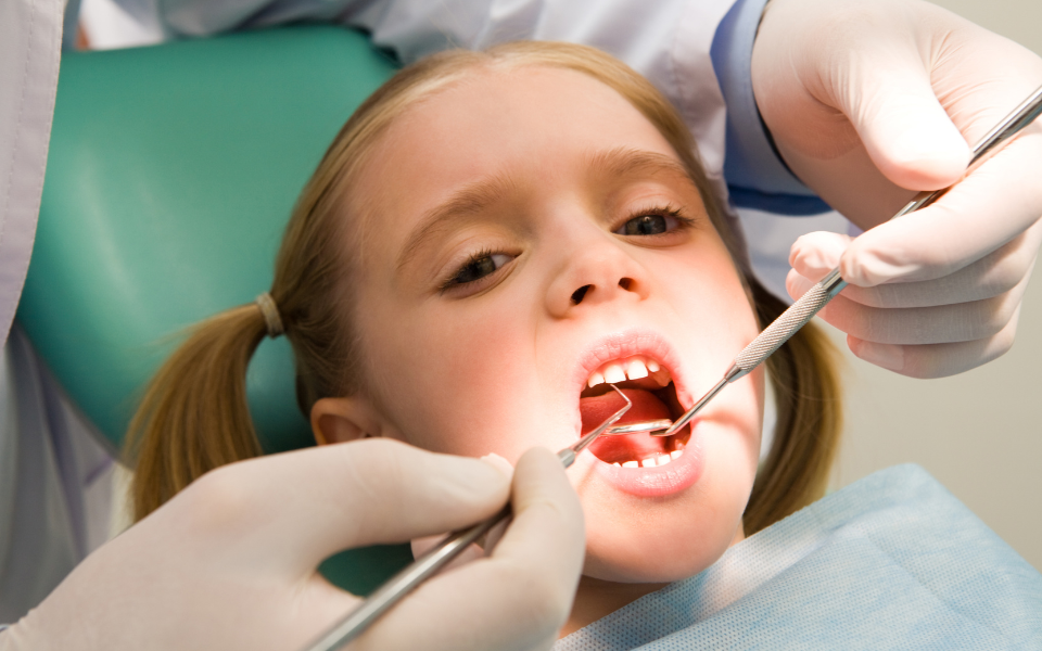 Eu tenho culpa da cárie nos dentes dos meus filhos?